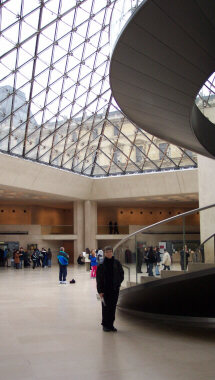 Mother below the Louvre Pyramid